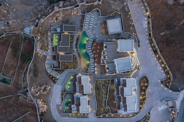 Aerial view of Maximus Mykonos hotel complex in the Cycladic landscape